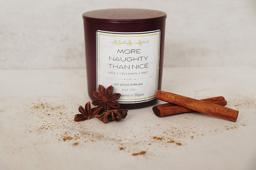 More Naughty Than Nice candle scented with apple cinnamon and spice