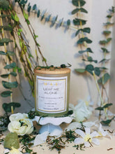 Load image into Gallery viewer, Leaf Me Alone candle scented with bamboo honeysucle and orchid
